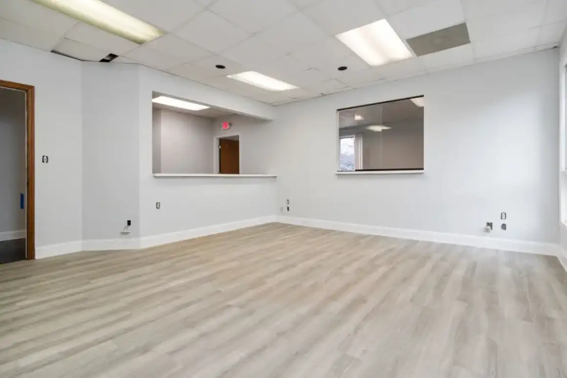 Finished commercial interior with the even lighting that determines the required finish level