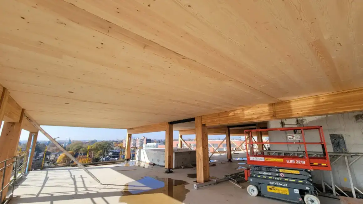 Commercial interior under construction with partition framing before drywall in Madison