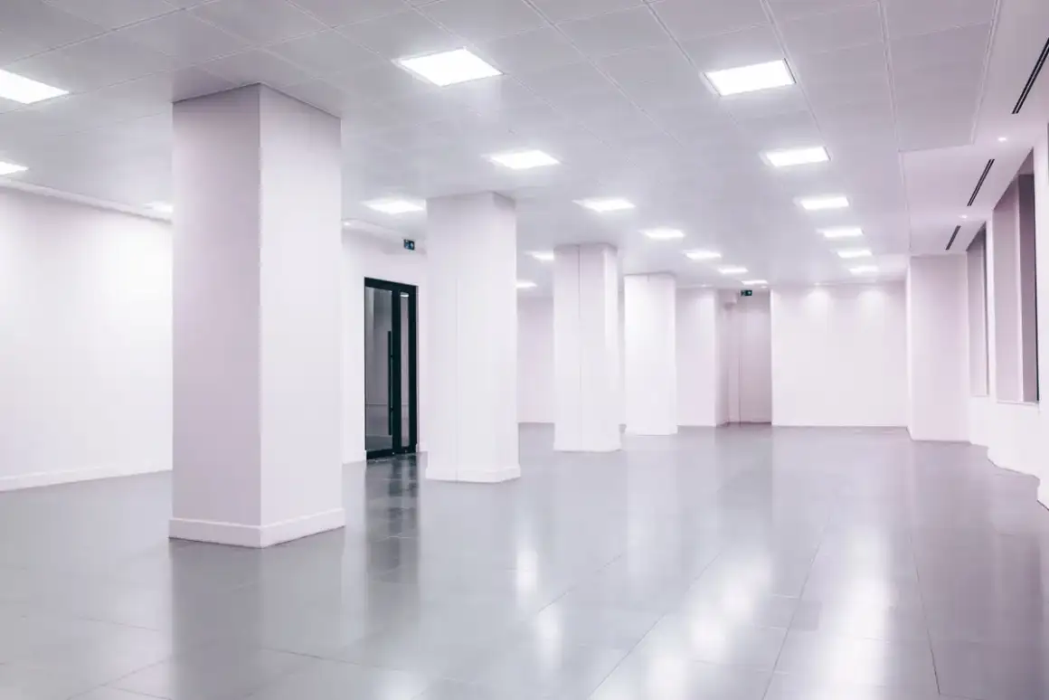 Finished office interior showing the even lighting that makes a mismatched repair obvious