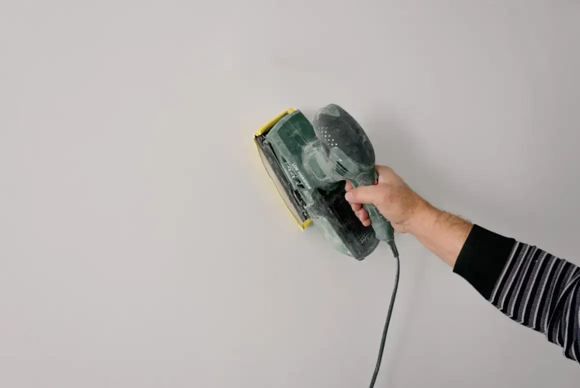 Joint compound drawn smooth across a seam with a finishing knife